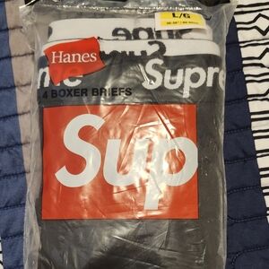 4 Supreme Hanes Black Boxer Briefs with Red and White Packaging
